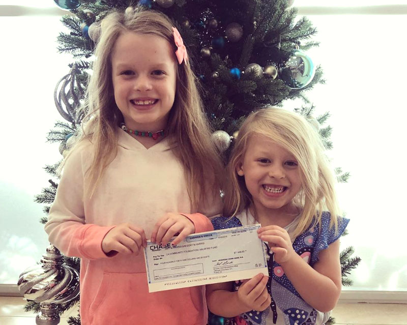 The Harris sisters who donated proceeds from their lemonade stand sales to wildfire relief.