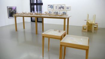 Elevator (foreground), Scholle Vaterland (right rear), Schindler Shelter (left and center rear), Pull me from the wreckage (middle), Lyon Binennial, 2007, Installation Dave Hullfish Bailey