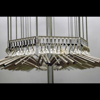 Coat Check Chimes Whitney Museum, 2008, nickel-plated aluminum and steel, 1,200 pieces, 100 in. x 100 in. x 100 in. Mungo Thomson