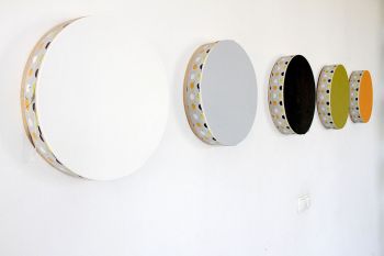5 Dot Ribbon Monochromes, 2012, Wooden drum frames, vinyl ribbon, canvas, acrylic paint, 16 in. x 100 in. x 4 in. Scoli Acosta
