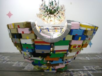 Rising Night, Lily White (installation view), 2007, Shoeboxes, cardboard, house paint, foil, tape, light, pressb, 5 in. x 5 in. x 5 in. Scoli Acosta
