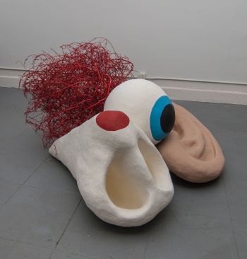 Senses at Auction, 2012, mixed media, tumbleweed, light from projector, 3 ft. x 5 ft. x 5 ft. Carmen Argote