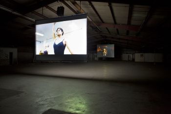 “Daggering”, 2 channel HD Raw video and sound installation, Installation view The Dallas Contemporary, Dallas, 2012 Nicole Miller