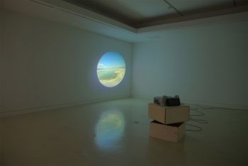 Lighthouse, 2010, one channel video, rotating pedestal, 40 ft. x 40 ft. x 10 ft. (dimensions variable) Jeff Cain