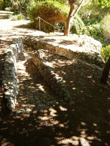 Incised Ziggurat within La Tierra de la Culebra ArtPark, 1999-2003, earth, riverstone, concrete, 21 ft. x 3 ft. x 18 ft. x 8 ft. within 30,000 sq ft site Tricia Ward
