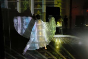 Serpentine Dance Performance, as part of Flashlight Filmstrip Projections, 2014, Plexiglas, 35 and 70mm filmstrips, ink, flashlights. Dancer: Connie D. Moore
Installation view: PICA TBA Fest 2014, Portland, OR, Photo: Evan La Londe, Commissioned project Jennifer West