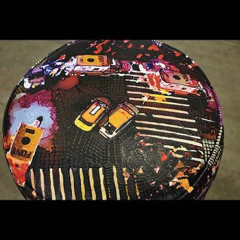 Ottoman Empire Series-Detail NY Subway Bombing, 2017, mixed media on vintage ottoman, 14" (h) x 19.5" (d). Jaime Scholnick