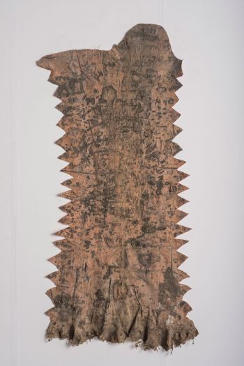 A Medio Camino (Figura #1); 2018; rubber, tree residue, paint residue, pine gum, found debris on canvas; 72 in. x 36 in. Eddie Rodolfo Aparicio