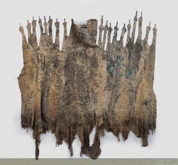 Aquellos Que Apuntan Con El Dedo Medio / Those Who Point With Their Middle Finger (11th St. and Union St., Los Angeles, CA); 2017; rubber, sulfur, tree residue, paint residue on cotton; 102 in. x 108 in. x 6 in. Eddie Rodolfo Aparicio