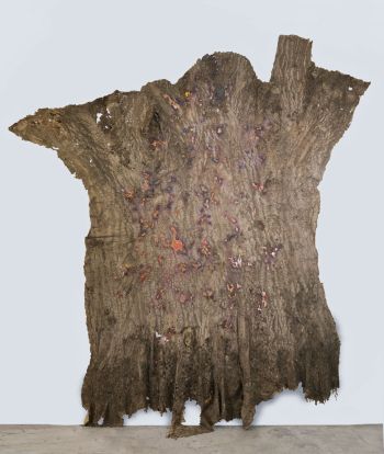 Huelemos Como El Roble Que Ta Estaba Aqui; 2016; rubber, sulfur, tree residue, paint residue, resin, ceramic on linen; 168 in. x 108 in. x 6 in. Eddie Rodolfo Aparicio
