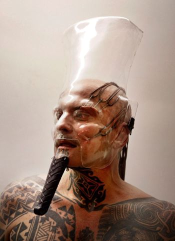 Incorruptible Flesh: Messianic Remains; 2014; performance with Egyptology-themed costumes “appropriating Kenneth Anger”; cast and heat formed plastic mask; facehooks; attached leather beard Ron Athey