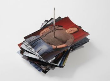 Dead Comedians; 2018; photographs of famous comedians who have died from Lenny Bruce to the present through receipt spike; 7 in. x 7 in. x 7 in. Gary Cannone