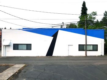 Convergence; Coeur d'Alene, ID; acrylic on concrete building facade; 216 in. x 769 in. Tofer Chin