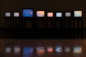 Details from The Weather Inside Me (Bombay Sunset); 2010; color digital photograph, 8 synchronized digital videos on CRT television sets, 1 unsynchronized digital video; 39 minutes 40 seconds; installation dimensions variable. Neha Choksi