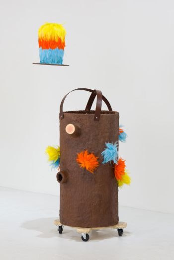 Tree and Birds; 2017; resin, feathers, fabric, leather, wood; hat form: 15 in. x 13 in. x 13 in.; tube form: 50 in. x 20 in. x 21 in. Photo by Ruben Diaz Phyllis Green