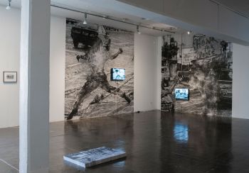 Installation view of Untitled (la revolución es la soluvión!) at Artpace San Antonio; 2017; mixed media; dimensions vary Kang Seung Lee