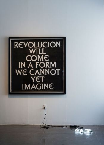 Installation view of Untitled (Revolucion will come in a form we cannot yet imagine) & Untitled (Hyuk-myung) at Artpace San Antonio; 2017; graphite on paper, neon; drawing 56 in. x 56 in., neon approx. 14 in. x 16 in. Kang Seung Lee