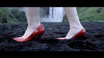 Video still from Peep Totter Fly, 2011, interactive installation at LACE, Los Angeles, CA, video, high heeled shoes, dimensions vary Cheri Gaulke